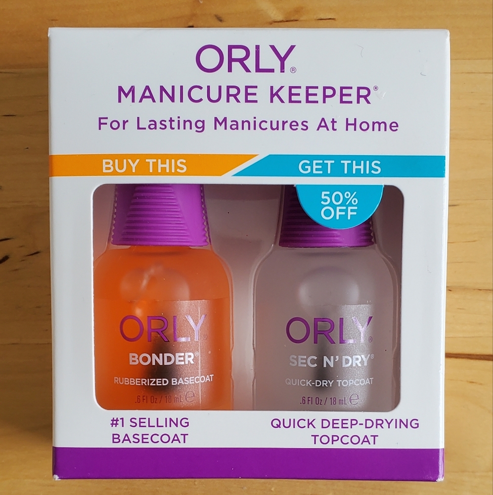 Sold Orly Manicure Keeper Set with Orange and Purple Bottles
